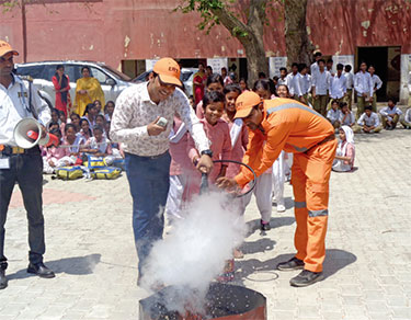 Students receiving fire extinguisher training - Candor TechSpace