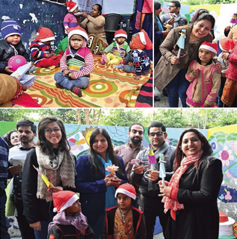 Candor employees distributing gifts to underprivileged children